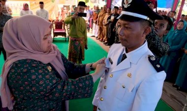 Bupati Masnah Lantik Kepala Desa  Gedongkarya Kumpeh