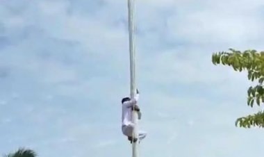 Viral! Aksi Heroik Riski Lamato pelajar Gorontalo Utara Selamatkan tali Bendera yang Putus