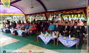 Diguyur Hujan, Bupati Tanjab Timur Tetap Pimpin Upacara HAB Kemenag RI