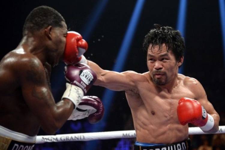 Pacquiao Tumbangkan Broner Kemenangan Unanimous Decision